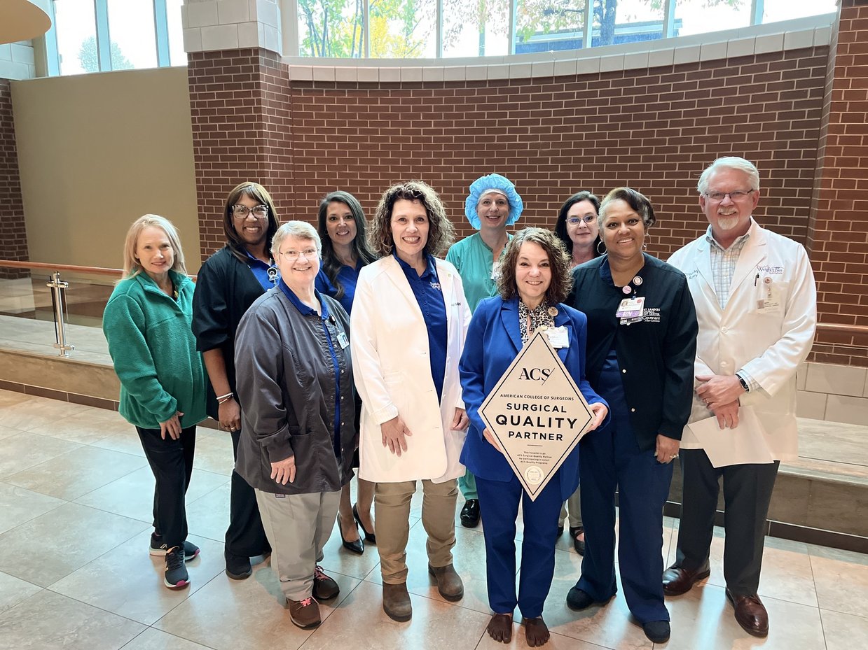 Fort Sanders Regional Medical Center bariatric team with MBSAQIP sign