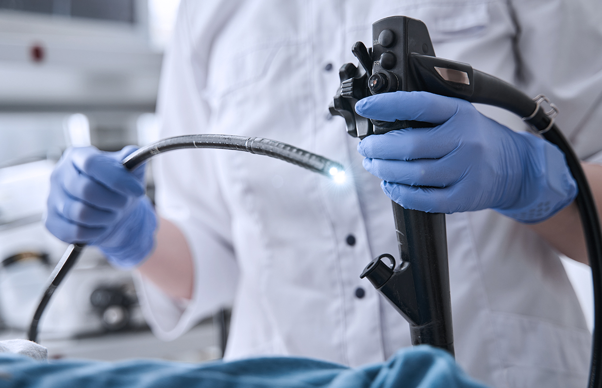 surgeon with endoscopic tools for endoscopy