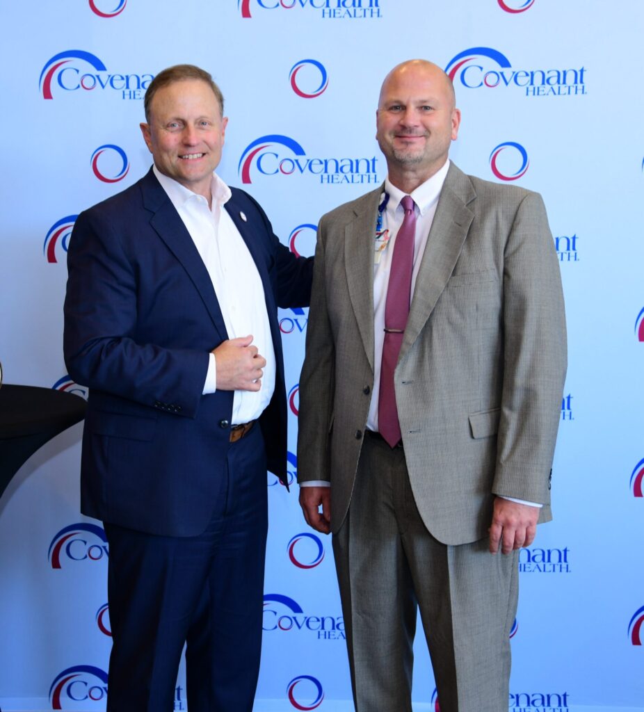 Jim VanderSteeg and Alan Buck posing at the President's Excellence Awards