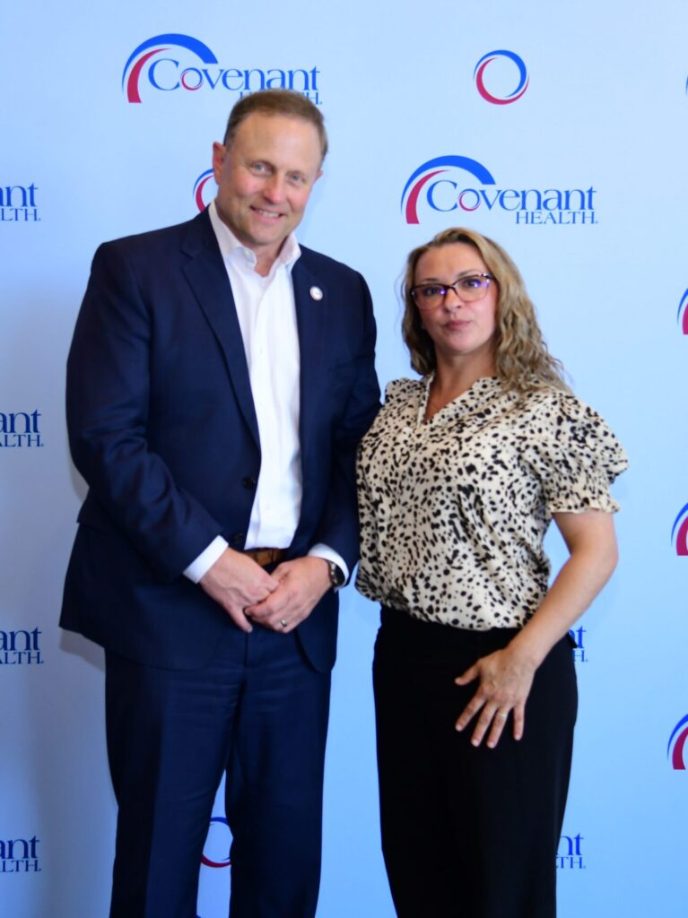 Jim VanderSteeg and Carrie Armes posing at the President's Excellence Awards