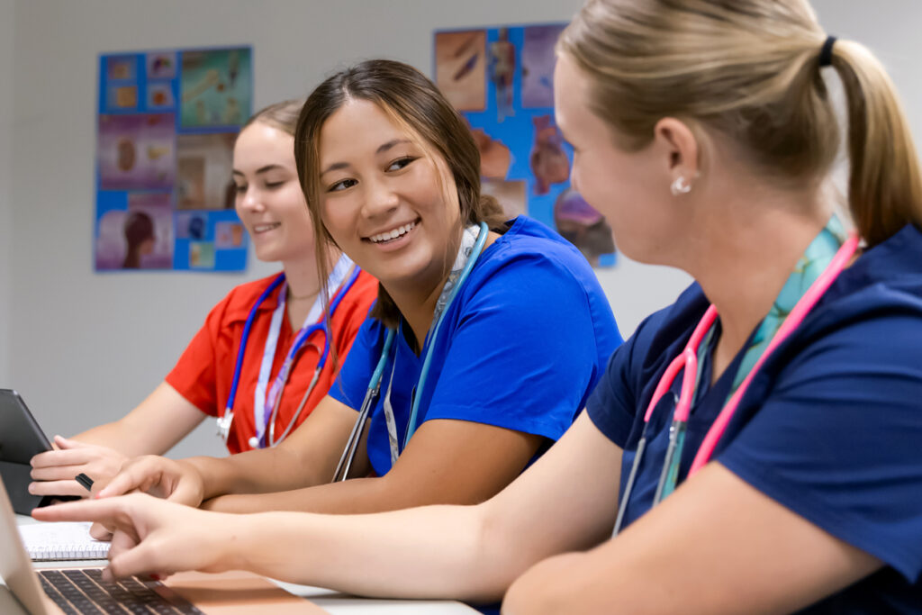 Group of high school students working in hospital. 